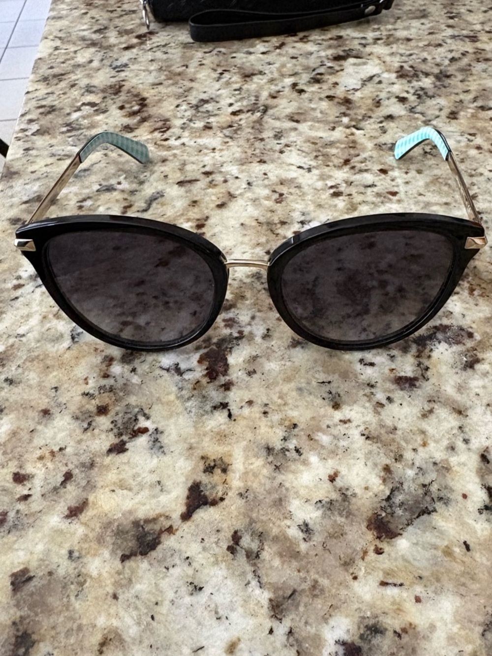 Black Cat-Eye Sunglasses with Light Blue Temples